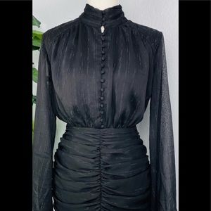 Black house if harlowe dress. Short dress with long sleeve.